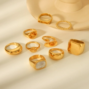 9-piece gold-plated titanium steel ring set with sunburst and mother of pearl inlays