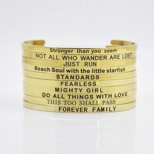 Set of 10 golden stainless steel open bangles with inspirational engraved quotes