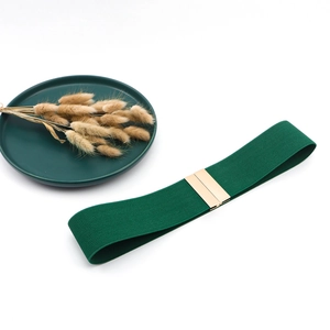 Elastic wide belt for down jackets in dark green with a gold buckle for women