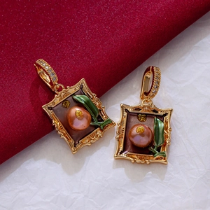 Detailed view of vintage gold flower earrings with freshwater pearls on red fabric