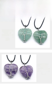 Detailed view of 30mm heart pendants with tree of life wire wrap in aventurine and amethyst