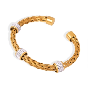 Golden woven hollow open bangle with silver accents and sparkling crystal details