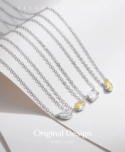 Detailed close-up of S925 sterling silver necklaces with geometric crystal pendants