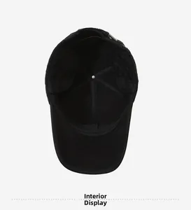 Detail of warm quilted lining and foldable ear protection on men's winter baseball cap