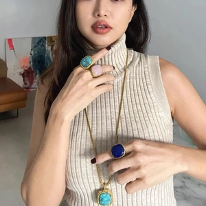 Vintage style gold rings and necklace set with pink crystal and turquoise stones