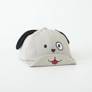 Close-up of baby baseball cap with detailed puppy embroidery and long plush ears