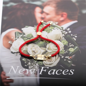 Adjustable red rope bracelet with gold square clasp and micro-pave zircon cross charm