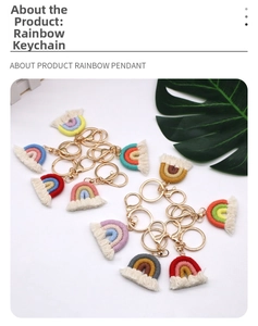 Detail of handmade macrame rainbow keychains with colorful cotton rope and white tassels