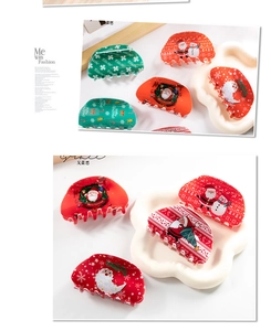 Detail of Christmas hair claws featuring Santa Claus and snowman patterns on a white tray
