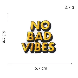 Cartoon embroidered patch featuring No Bad Vibes text with dimensions 6.7x6.3cm