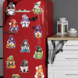 Halloween gnome and skeleton magnets set on a red garage door for festive party decoration