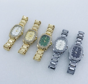 Set of luxury quartz watches with rhinestone oval bezels in gold and silver finishes