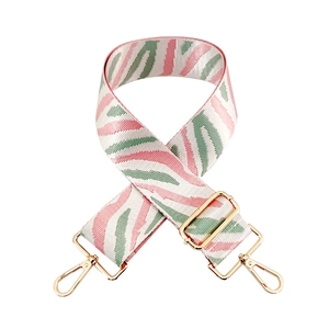 Adjustable wide shoulder strap with green and pink zebra pattern and gold metal hooks