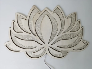 Detailed top view of lotus-shaped wooden mandala yoga night light with intricate carving