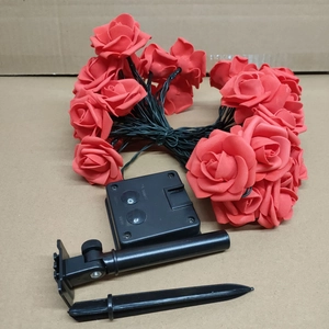 Solar powered red rose flower string lights with panel and ground stake for garden decor