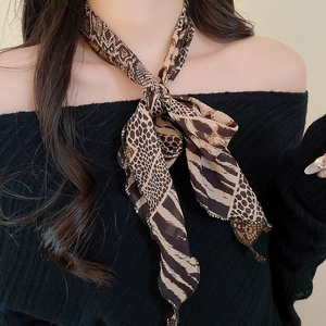 Detail of leopard and zebra print chiffon scarf necklace with vintage resin pendant