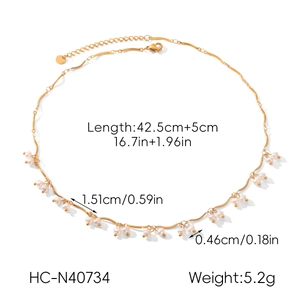 Detail view of gold pearl necklace with OT clasp and precise measurement dimensions