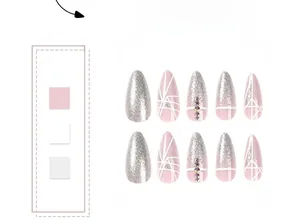 Macro view of pink press-on nails featuring silver glitter and geometric line art with rhinestones
