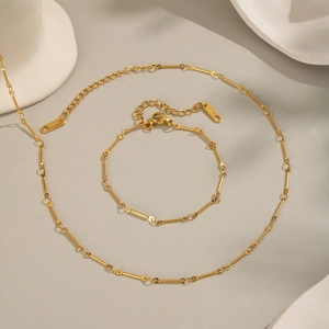 Minimalist 18K gold-plated stainless steel bone-link chain necklace and bracelet set