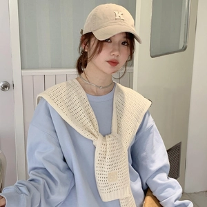 Beige knitted shawl wrap for women with letter patch and matching baseball cap accessory