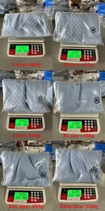 Weight display for light blue waffle texture polo set from size S (405g) to XXXL (530g)