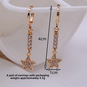 Detail of gold-plated star tassel earrings with white zircon, length 4cm and weight 4.5g