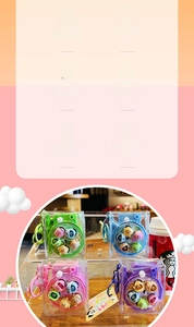 Mini camera-shaped clear keychains featuring colorful cartoon figurines in four bright colors