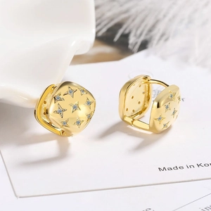 Gold square hoop earrings with engraved star patterns and white zircon stones