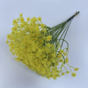 Close-up of artificial yellow baby's breath flowers for wedding floral arrangements