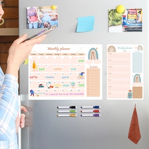 Magnetic dry erase planner set with rainbow design and colored markers on fridge