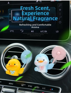 Detail view of cartoon car air vent clip with colorful rotating fan blades and animals