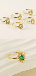 Macro view of 18K gold adjustable ring featuring a premium green heart-shaped zircon stone