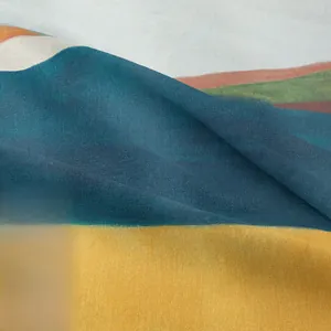 Close-up of bohemian landscape tapestry fabric with detailed mountain scenery print