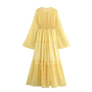 French vintage floral maxi dress in yellow with V-neck long sleeves and tiered cake skirt