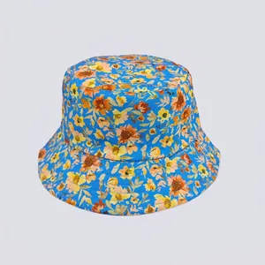 Detail of sky blue bucket hat with yellow floral print and multi-row stitched brim