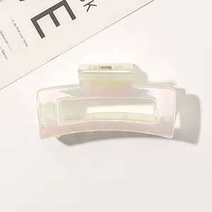 Detail view of the iridescent pearlescent finish on the square hollow hair claw clip
