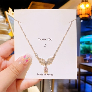 Elegant angel wing necklace with pink water drop zircon pendant on silver chain
