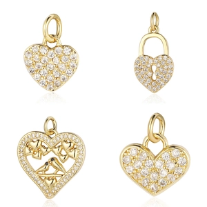 Set of four gold heart pendants with cubic zirconia for DIY necklaces and bracelets