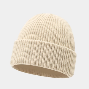 Close-up of the ribbed knit texture and wide folded brim on the beige beanie