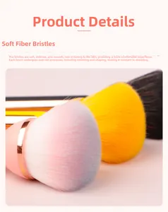Macro detail of soft synthetic fiber bristles on powder brushes with gold-rimmed tubes