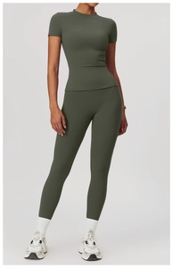 Detail of dark green brushed yoga set featuring slim fit T-shirt and high waist leggings