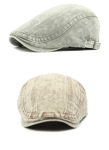 Detail of washed cotton ivy caps in grey and brown with adjustable metal buckles