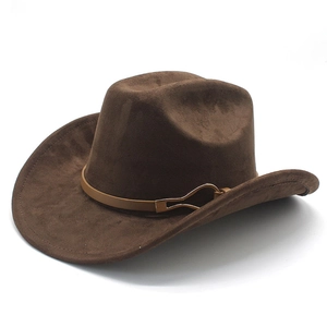 Detailed view of brown felt cowboy hat with leather band and golden metal buckle decoration