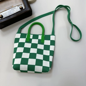 Green and white checkerboard knitted tote bag with round handles and long strap