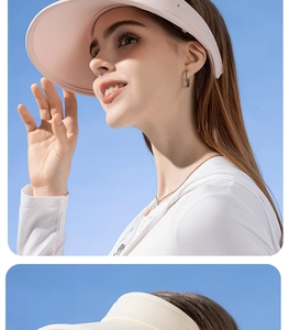 Detailed close-up of pink and beige wide brim sun visors for women with UPF50+ protection