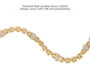 Macro shot of 18K gold plated brass bracelet with inlaid rectangular zircon crystals