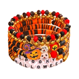 Halloween layered bracelet set with spooky ghost pumpkin charms and clay letter beads