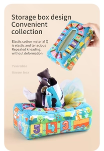 Blue soft tissue box toy with elastic cotton material and colorful fabric sheets