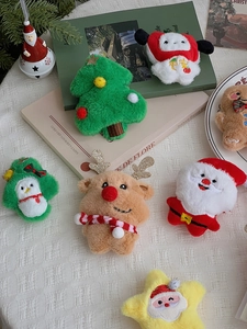 Detailed plush Christmas ornaments set featuring festive embroidery and sequin textures