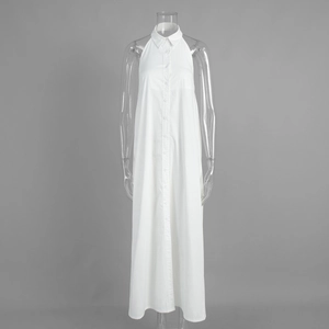 Detail view of white cotton sleeveless shirt dress with collar and button-down front
